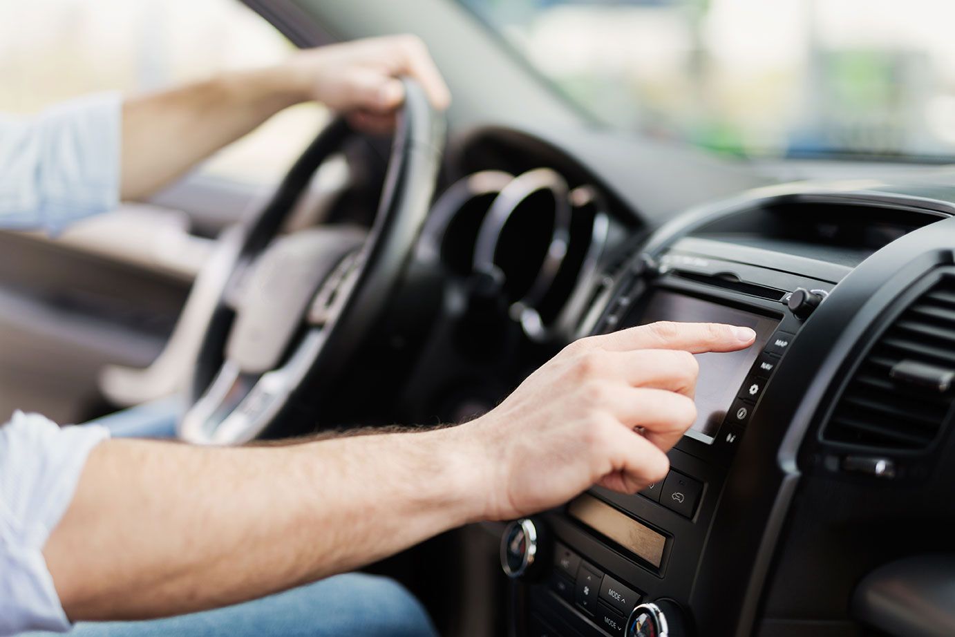 man-using-ac-controls