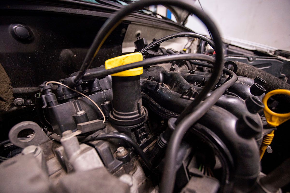 car-engine-detail-in-a-workshop-interior-ready-for-2025-10-16-15-40-04-utc
