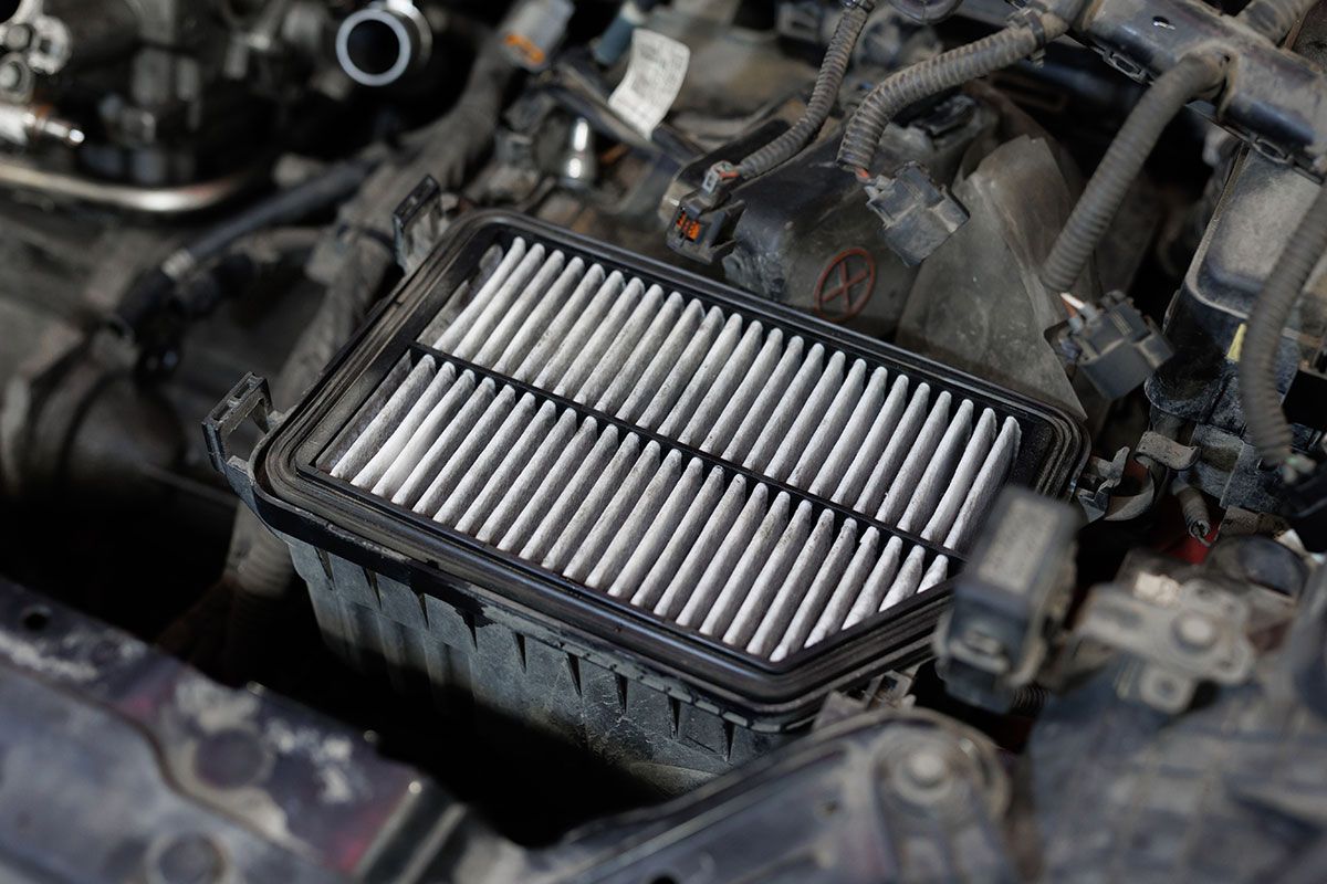 auto-mechanic-checking-cleaning-and-replacing-car-2025-01-10-20-40-16-utc%281%29