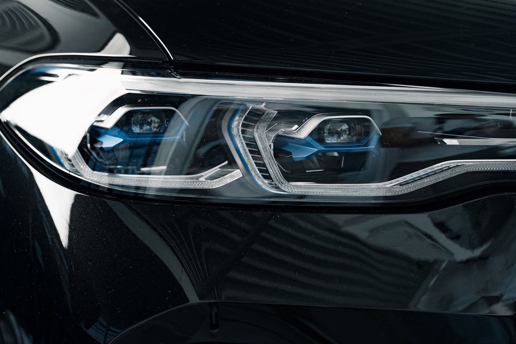 headlights-of-a-new-white-luxury-car