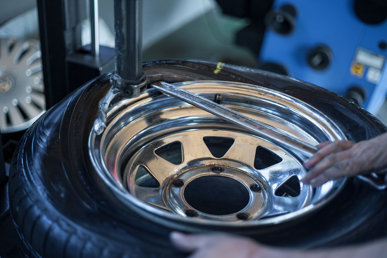 selective-focus-shot-of-a-mechanic-repairing-a-car