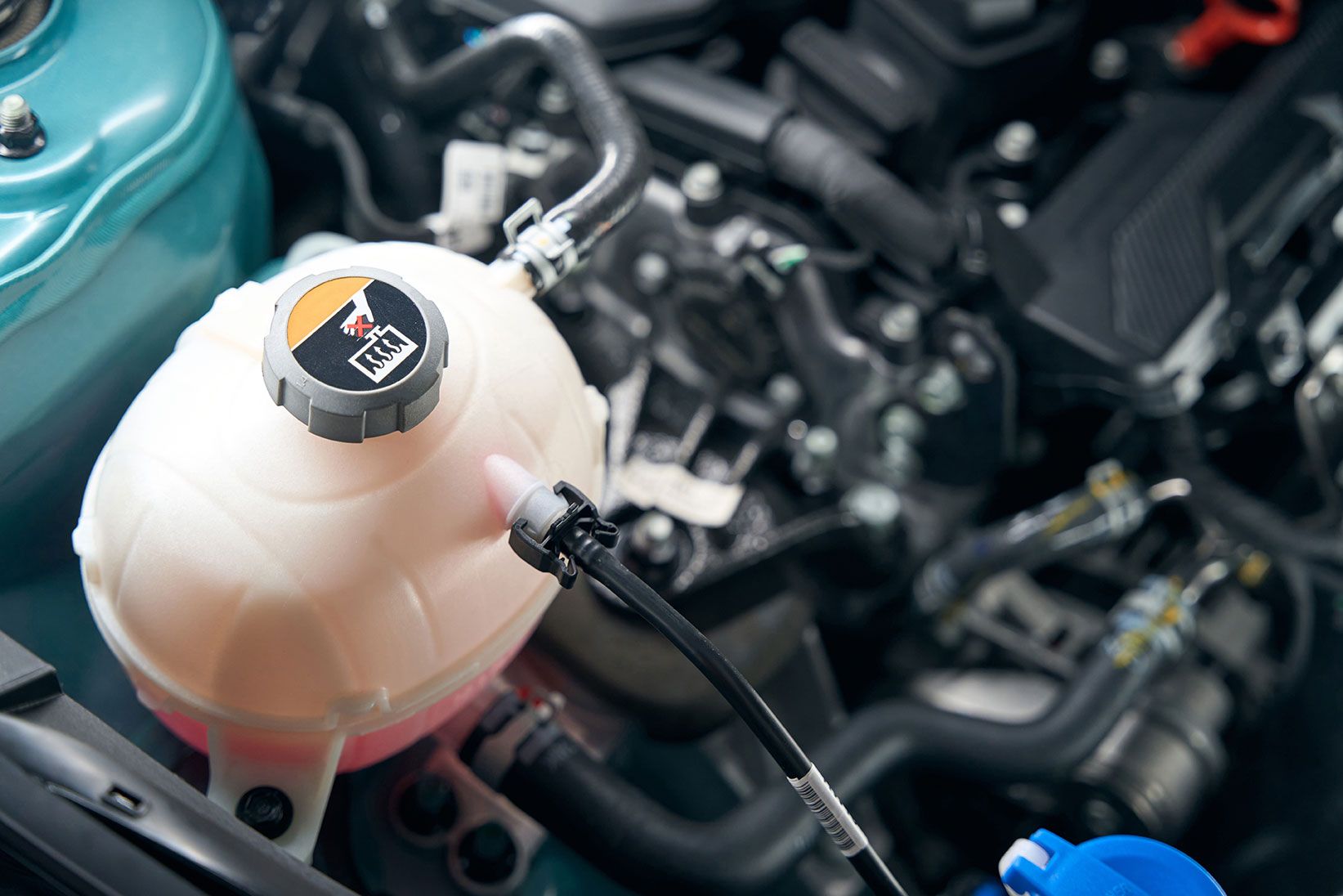 details-of-the-car-under-open-hood-20